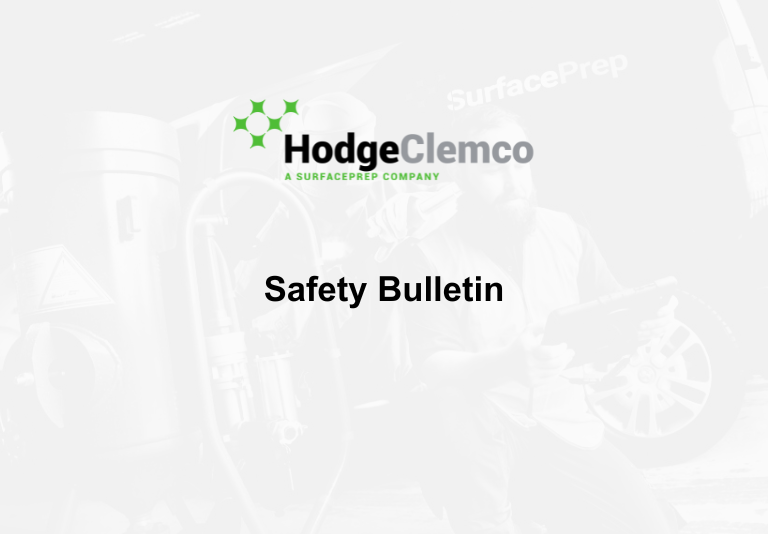 Faint white image of Hodge Clemco worker, with Hodge Clemco's logo, and plain black text which reads 'Safety Bulletin'