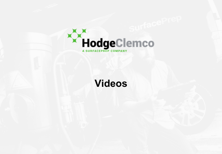 Videos placeholder thumbnail - White background with a feint image of a Hodge Clemco staff member, Hodge Clemco's logo and text which reads 'videos'.